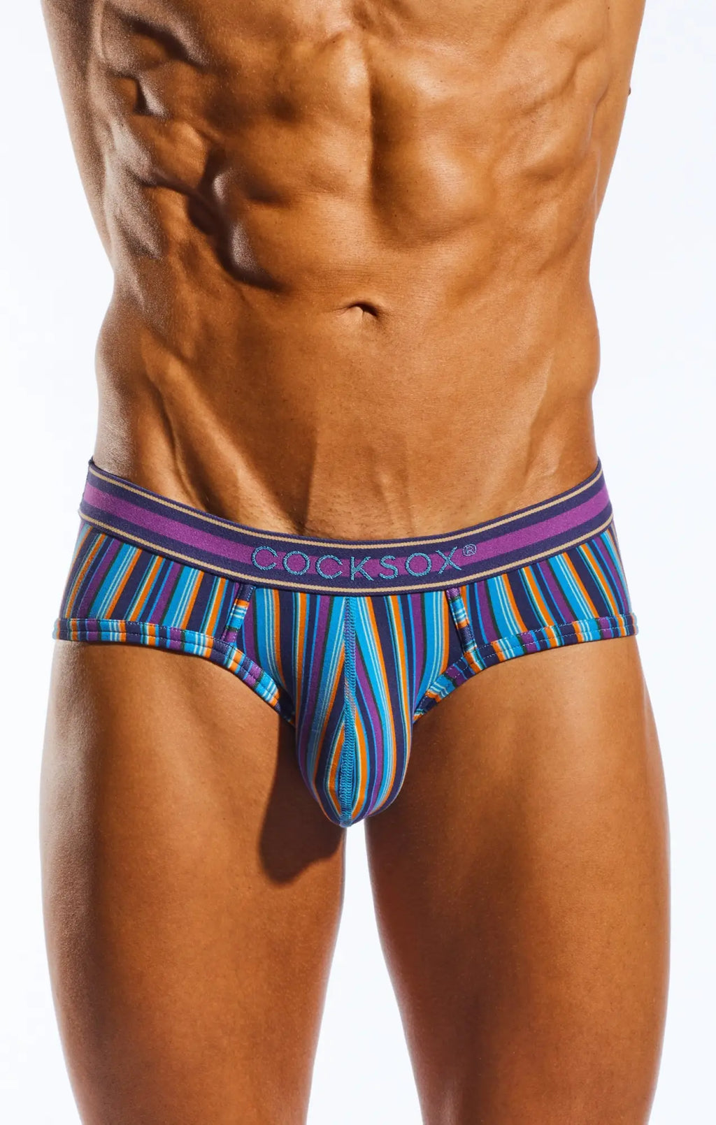 Vibrant striped cocksox cx76n sports brief in bold blue purple and orange hues for men