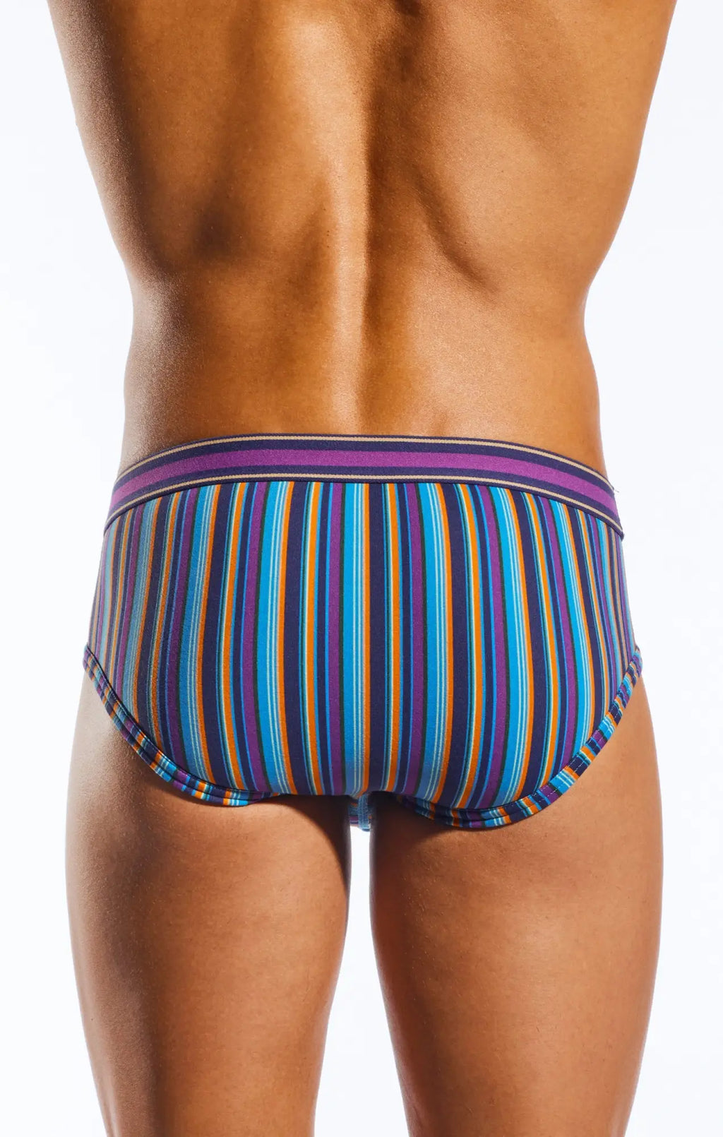Cocksox CX76N sports brief in vibrant blue purple orange and teal vertical stripes with matching elastic waistband