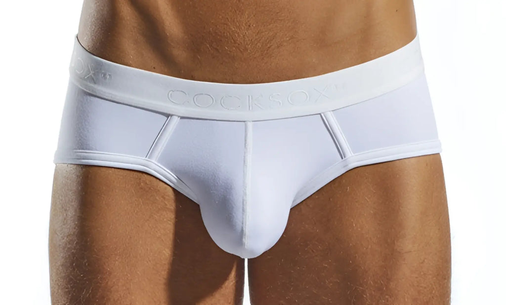 White cocksox cx76n sports brief with smooth form fitting design and subtle embossed branding on the waistband