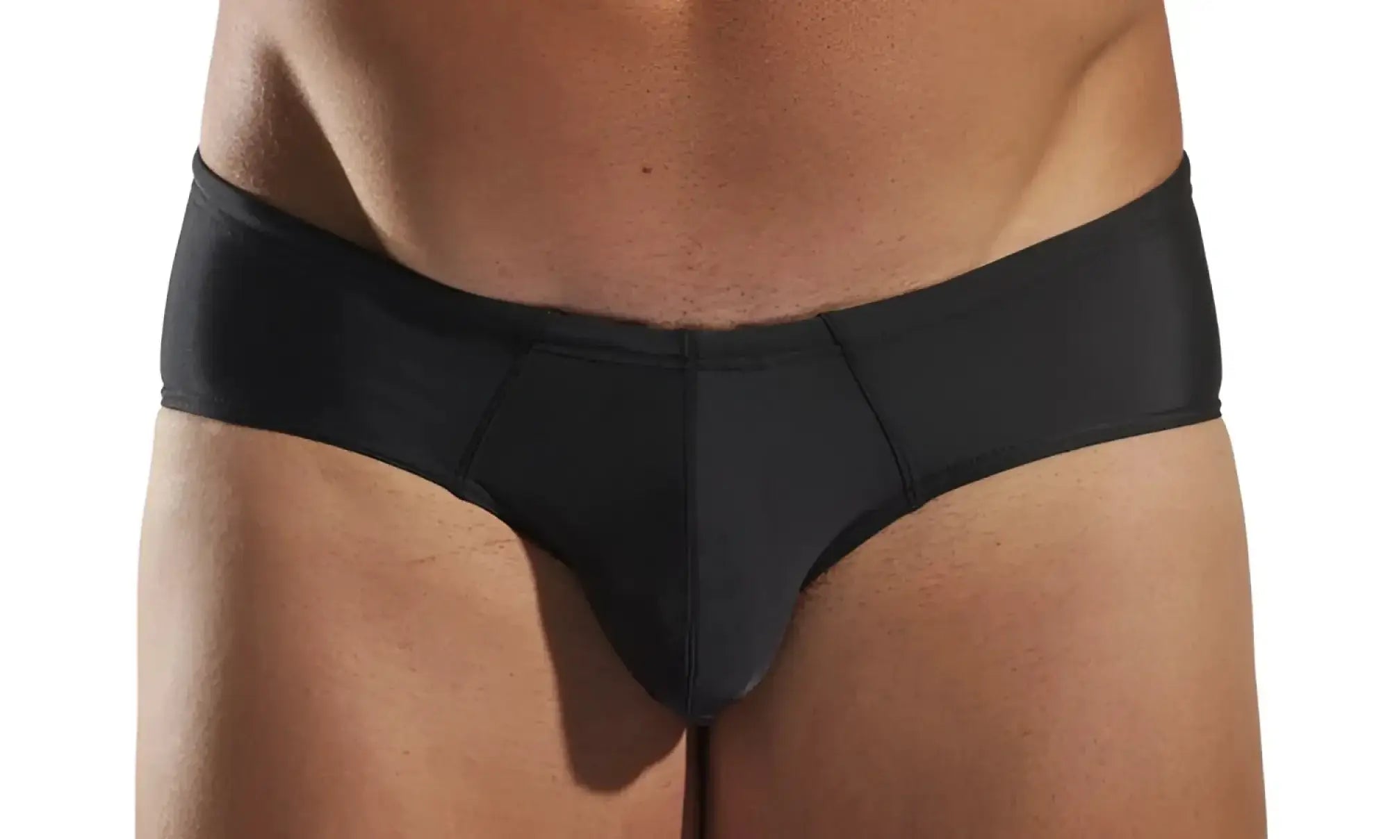 Black Cocksox CX79 boy leg swim brief with smooth stretchy fabric and subtle seam detailing front view