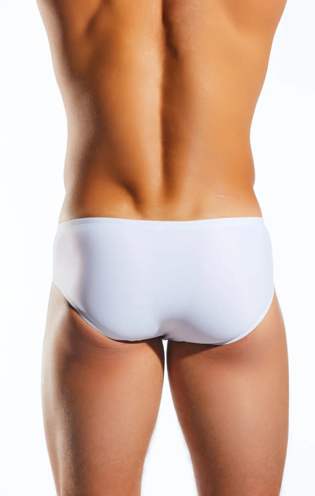 White cocksox cx79 boy leg swim brief with smooth form-fitting design for comfortable swimwear use