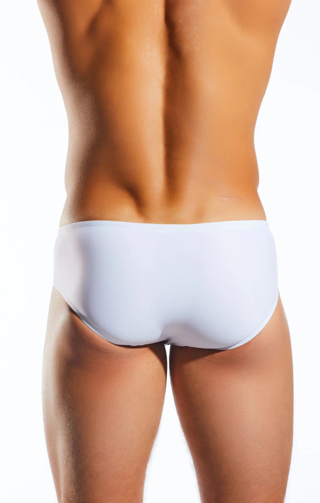White cocksox cx79 boy leg swim brief with smooth form-fitting design for comfortable swimwear use