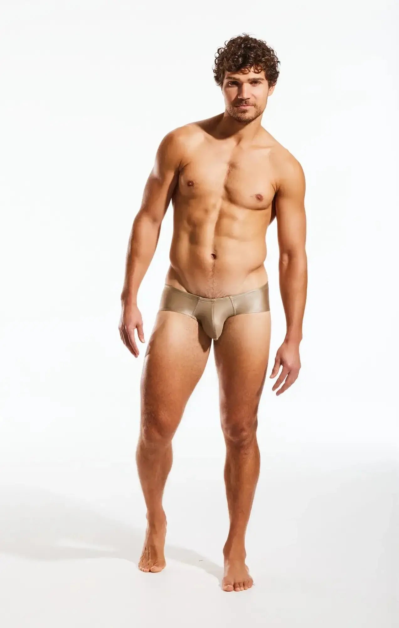 Cocksox CX79GS boy leg swim brief in sleek metallic gold with smooth form fitting design for swimwear use