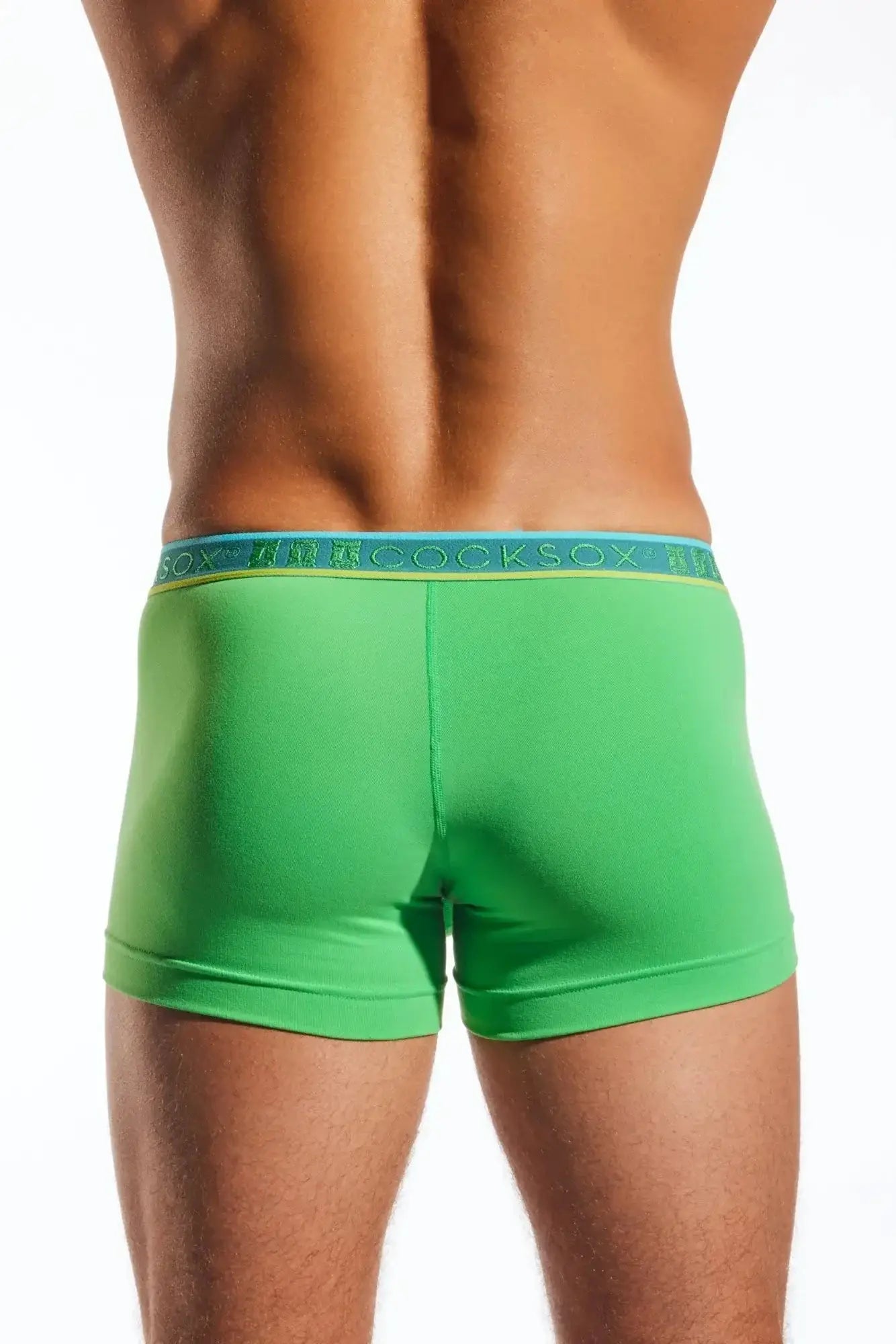 Bright green cocksox cx94 boxer briefs with a teal waistband and gold sox branding for comfortable wear