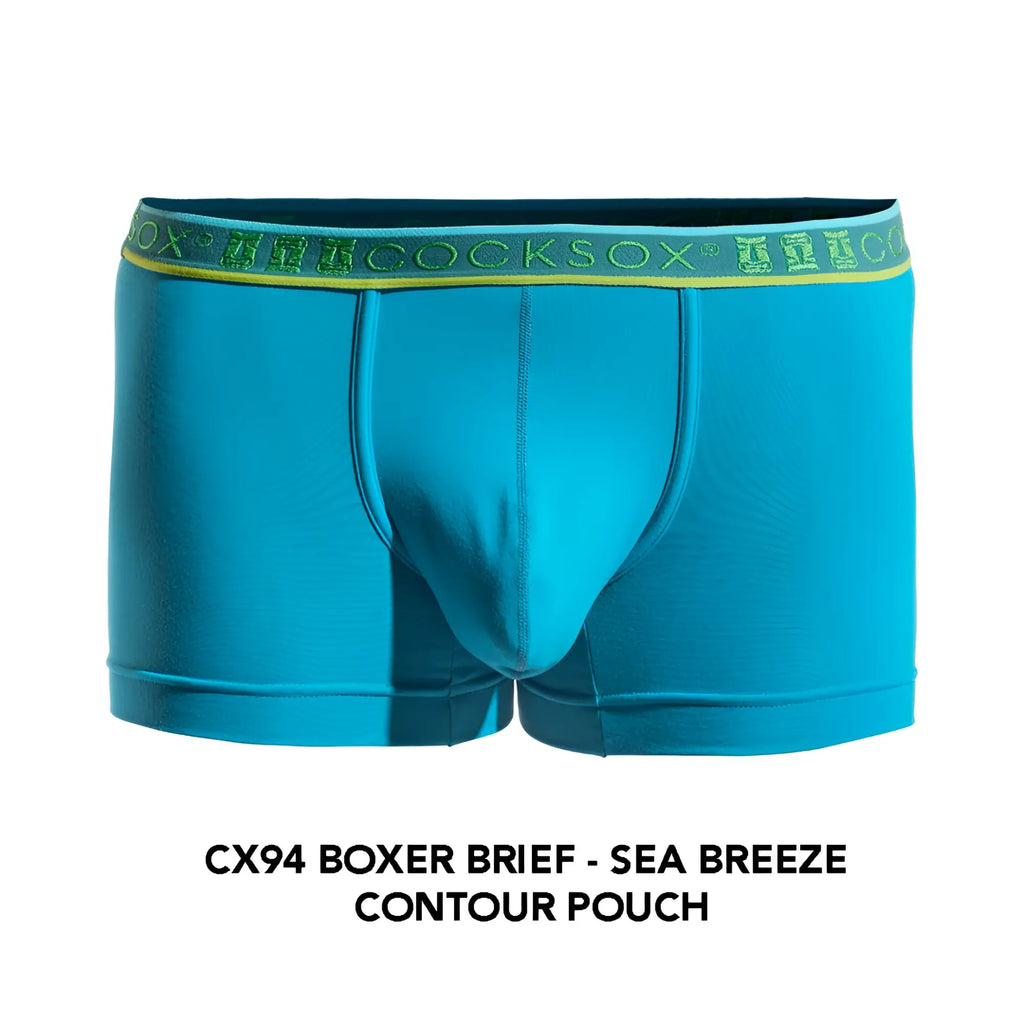 Bright turquoise cocksox cx94 boxer brief with lime green waistband featuring repeating brand lettering
