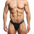 Black menâ€™s briefs with navy blue waistband and white lettering from cover male cmk083 thong collection