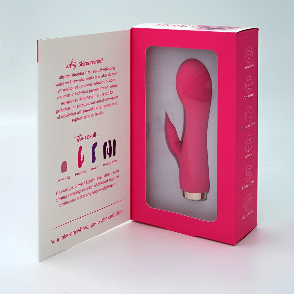 Pink silicone rabbit-shaped vibrator with gold base in branded packaging from creativec skins minis the bijou bunny