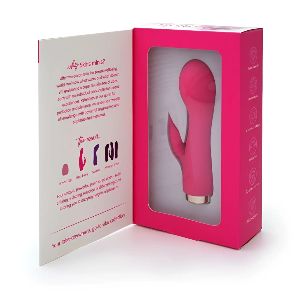 Pink silicone vibrator with metallic gold base in CreativeC Skins Minis The Bijou Bunny branded packaging