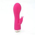 Vibrant pink silicone rabbit-shaped vibrator with smooth rounded body and small white base from CreativeC Skins Minis Bijou Bunny