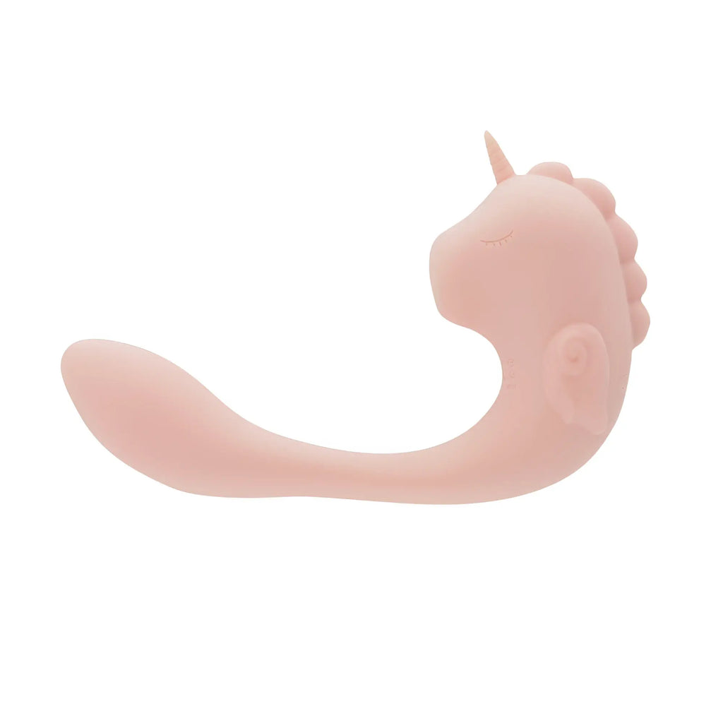 Pink silicone unicorn-shaped vibrator with smooth matte finish and closed eyes from creativec unihorn massager c horse coral throb