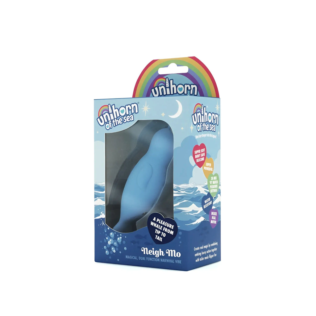 Blue silicone whale-shaped vibrator in rainbow-themed box labeled unicorn of the sea by Neigh Mo creativeC Unihorn of the sea