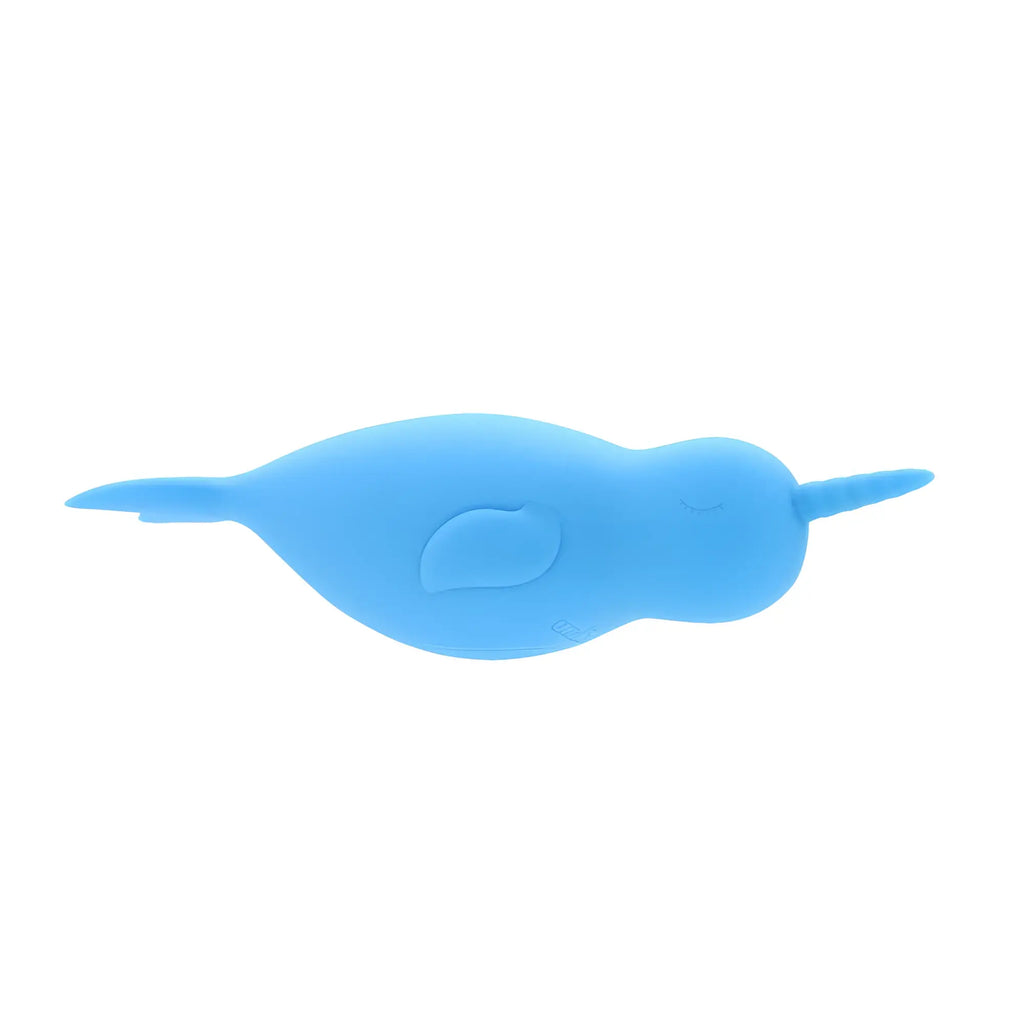 CreativeC Unihorn of the Sea Neigh Mo the Narwhal soft blue silicone bath toy with smooth rounded body and closed eyes