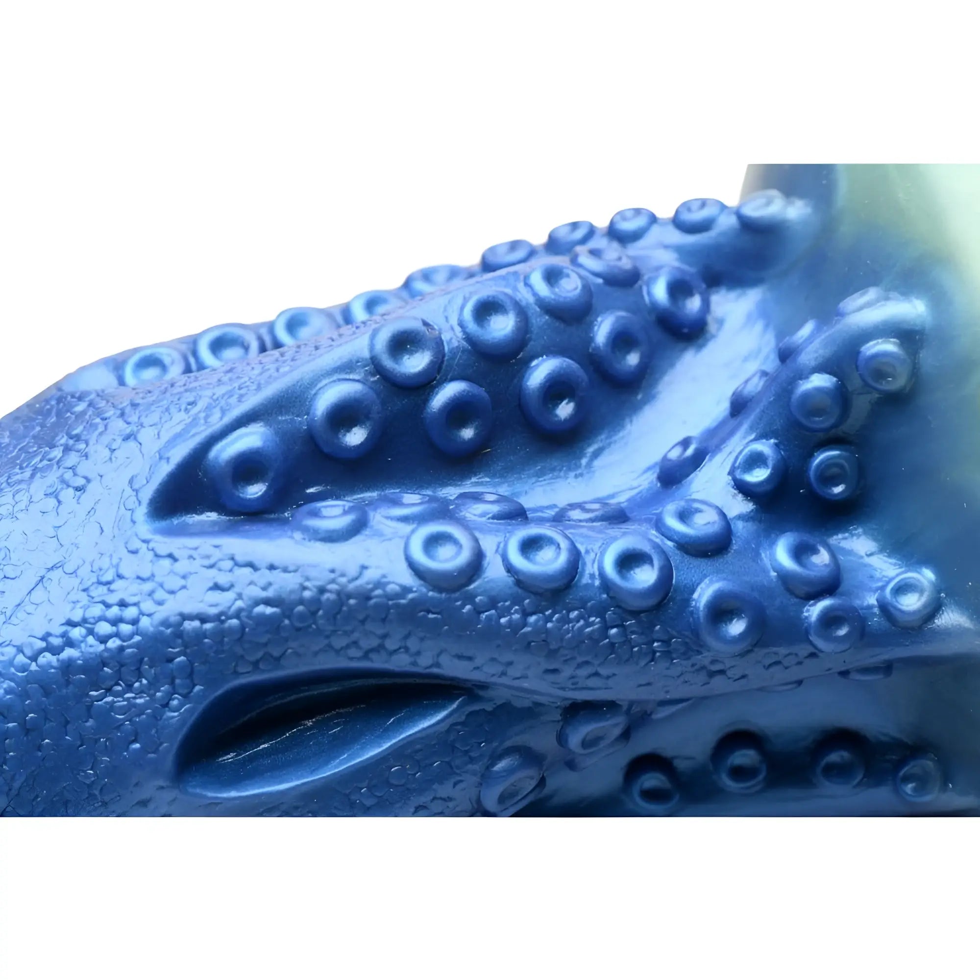 Blue silicone cocktopus octopus dildo toy with textured surface and raised suction cup details by creature cocks