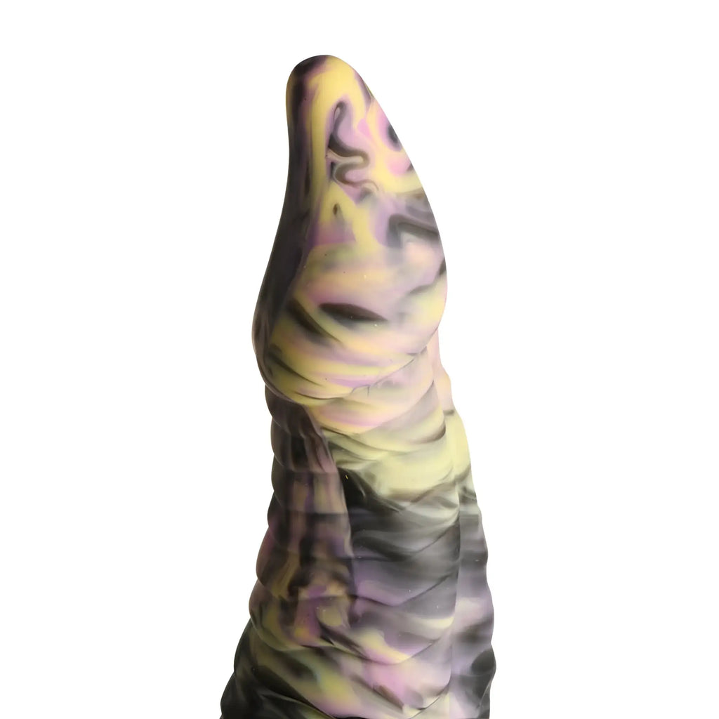 A tapered sculpted silicone dildo with yellow purple and black swirling pattern from creature cocks cyclops monster line