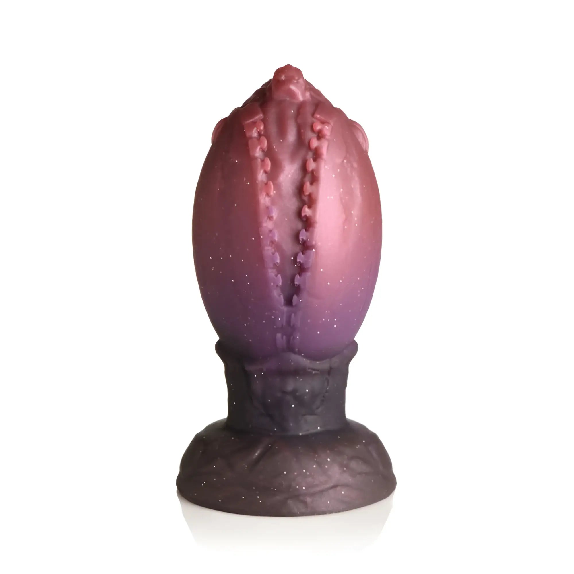 Creature Cocks Dragon Hatch silicone egg shaped candle with gradient purple pink speckled textured ridged surface