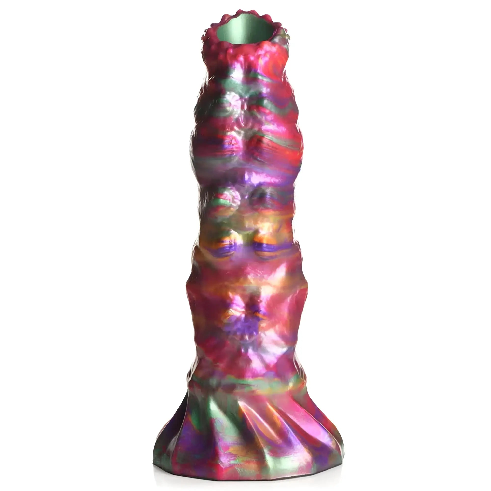 A tall iridescent ceramic vase with a textured sculpted surface in swirling pink purple and green next to creature cocks larva silicone ovipositor dildo with eggs