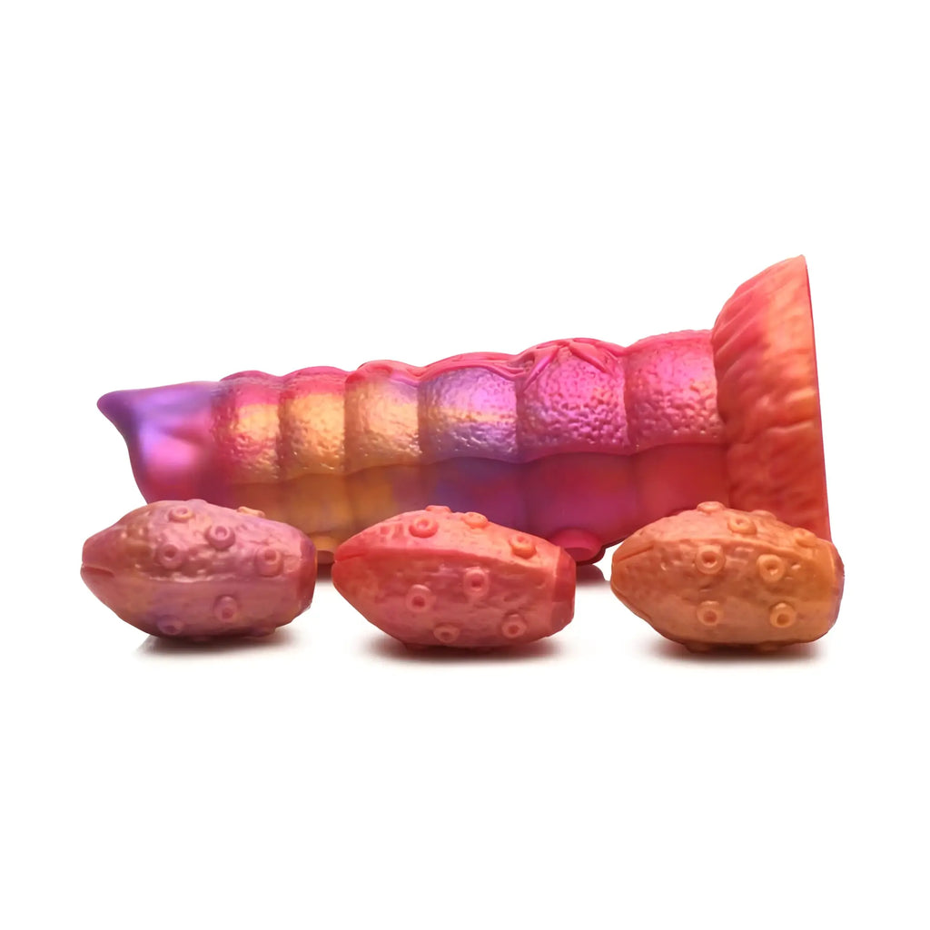 Creature Cocks Nymphoid Ovipositor silicone dildo in iris color with segmented phallic shape and three textured oval attachments