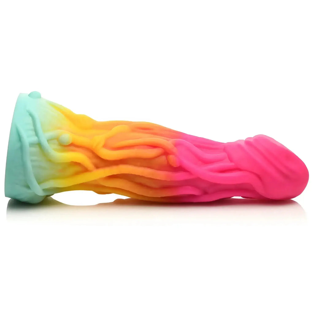 Creature cocks shape shifter alien silicone dildo with a rainbow gradient teal to pink and textured wavy surface details
