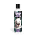 Clear plastic bottle with black cap of Creature Cocks Creature Slime unscented lubricant featuring white monster design