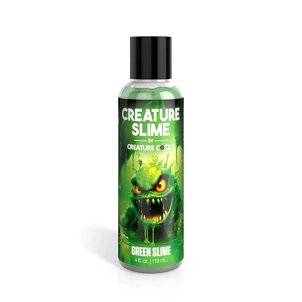 Creature cocks creature slime green slime water based lubricant in a clear plastic bottle with black cap and monster label