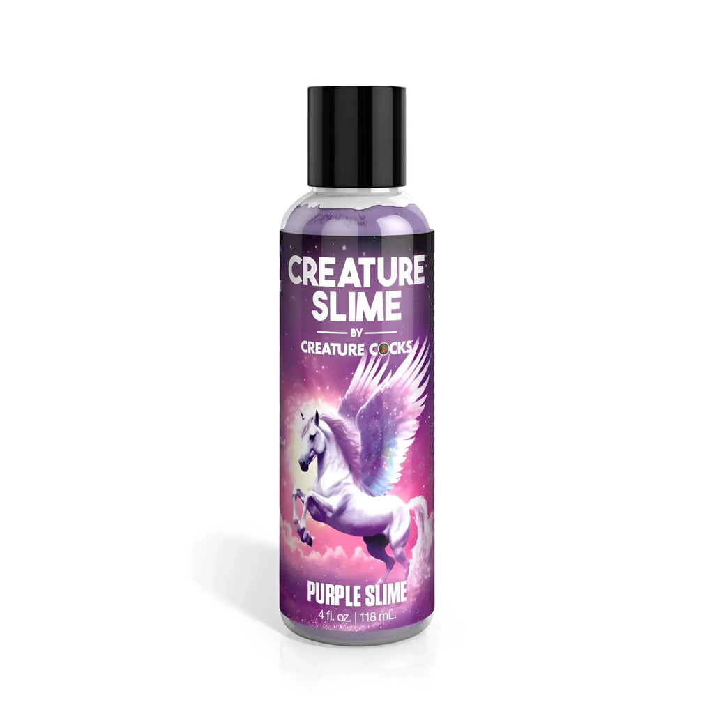 A clear plastic bottle with black cap contains purple creature slime water based lubricant by Creature Cocks