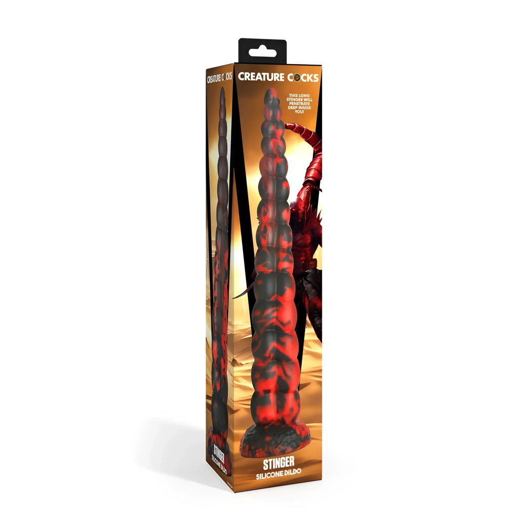 Red and black silicone dildo with segmented stinger design in packaging from Creature Cocks Stinger collection