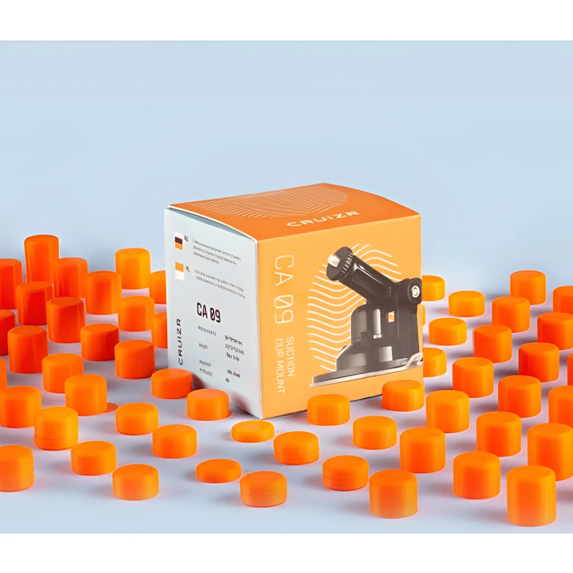 Orange cylindrical suction cup mounts made of ca 09 material in a box labeled cruiza for cruizr holder use