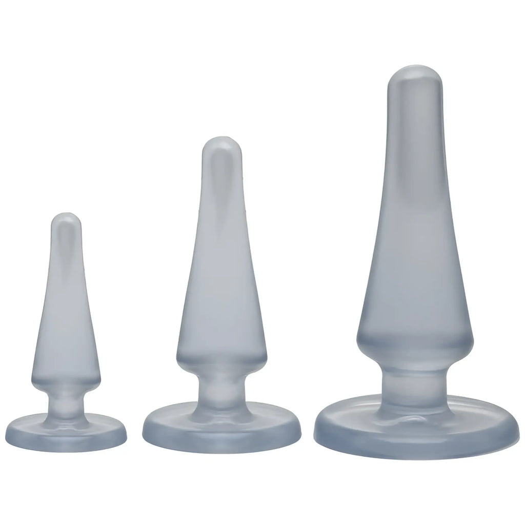 Set of three translucent gray silicone anal plugs with smooth tapered design from Crystal Jellies Anal Initiation Kit clear
