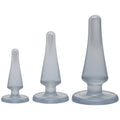 Set of three translucent gray silicone anal plugs with smooth tapered design from Crystal Jellies Anal Initiation Kit clear