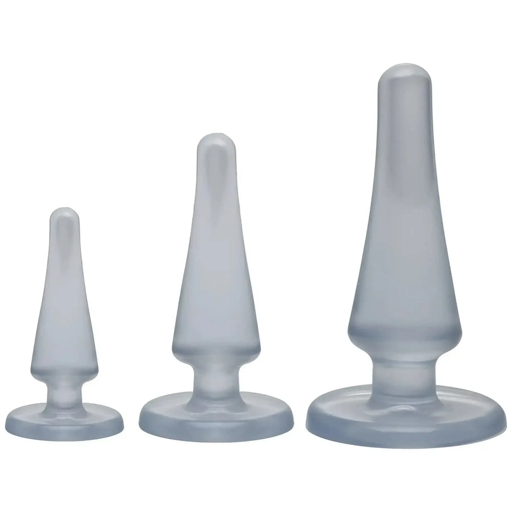 Set of three translucent gray silicone anal plugs with smooth tapered design from Crystal Jellies Anal Initiation Kit clear