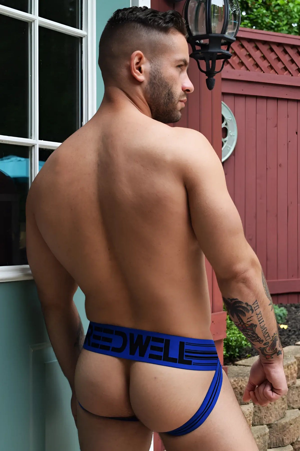 Blue and black cumdump jock briefs with a bold modern design and branded waistband for stylish activewear use