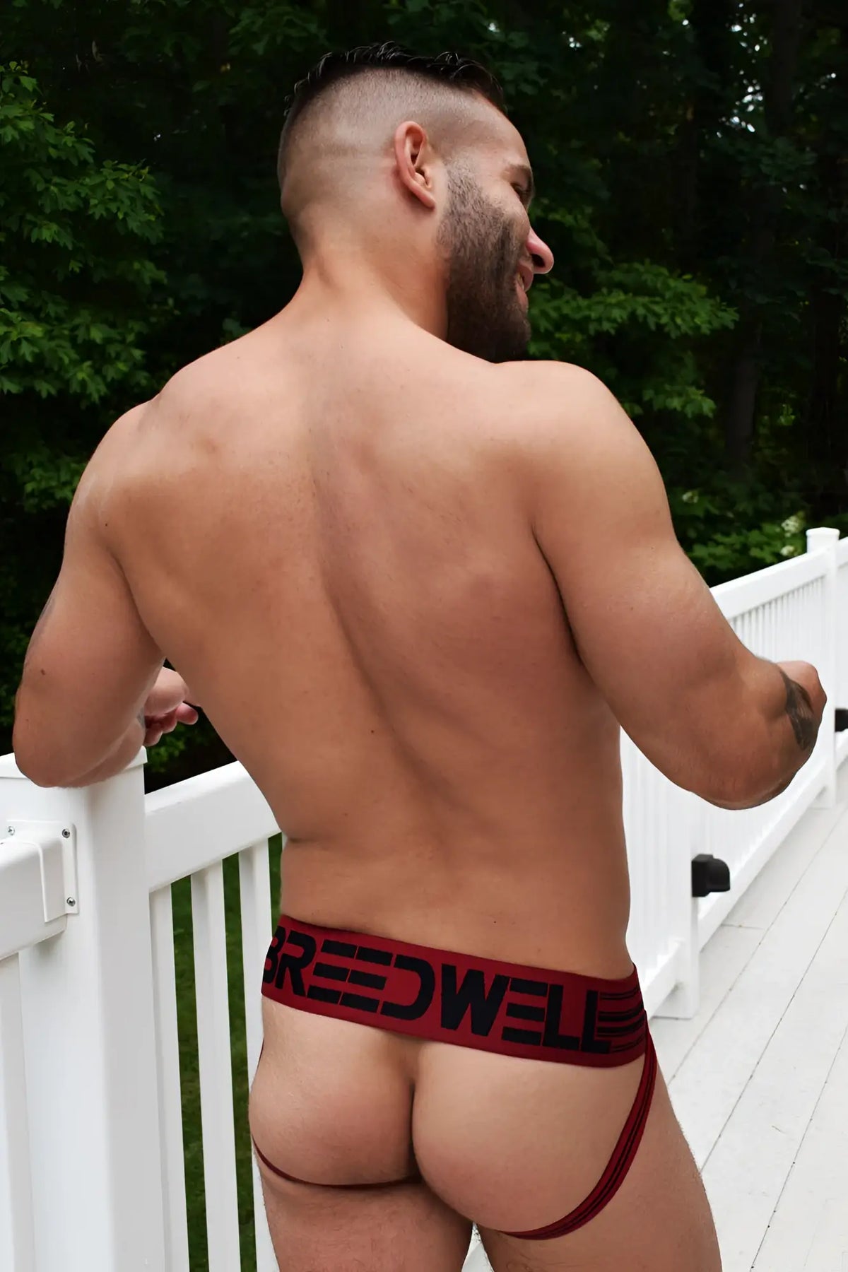 Red and black cumdump jock briefs with snug form-fitting design for supportive comfortable wear
