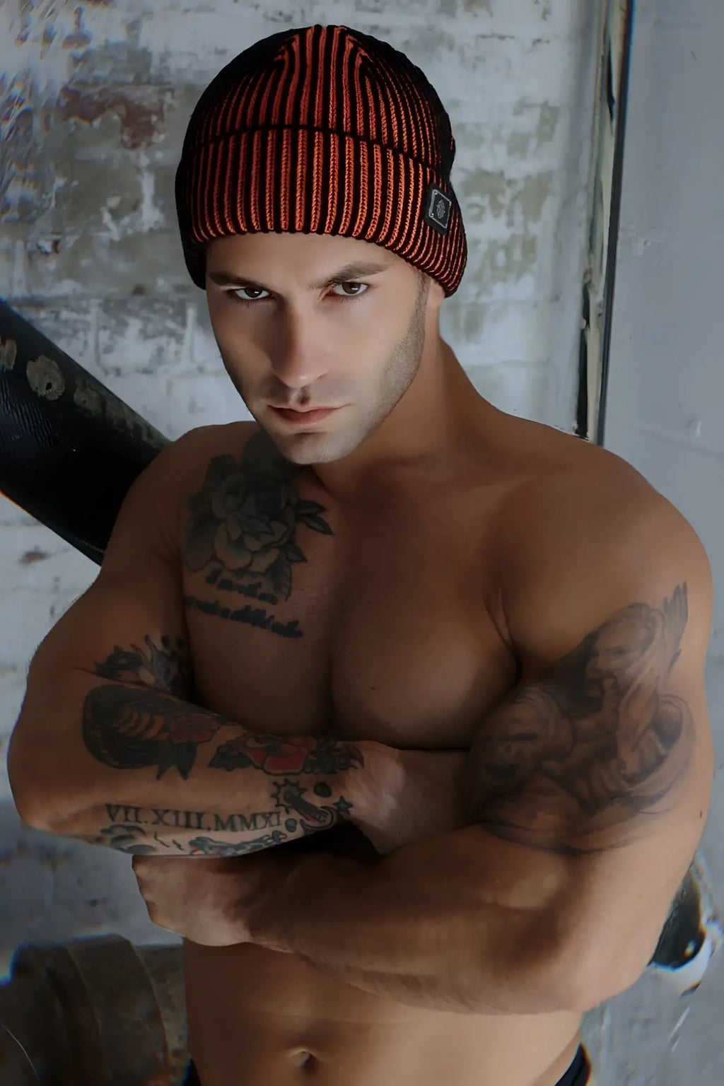 Darkroom rib beanie in red and black striped knit with a small front logo perfect for cold weather wear