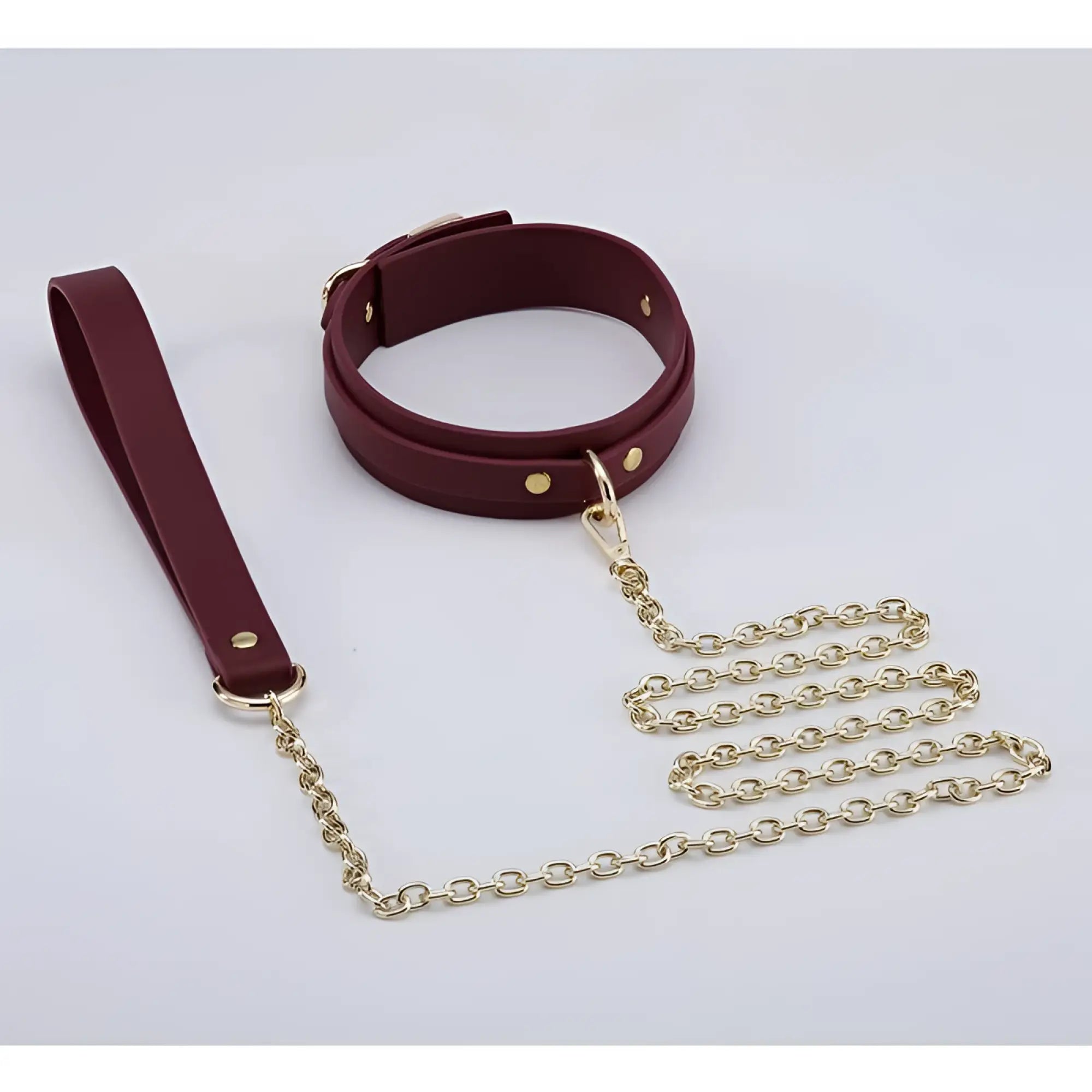 Burgundy leather collar with gold-tone hardware and matching chain leash from Daytona 8 pc deluxe bondage play kit
