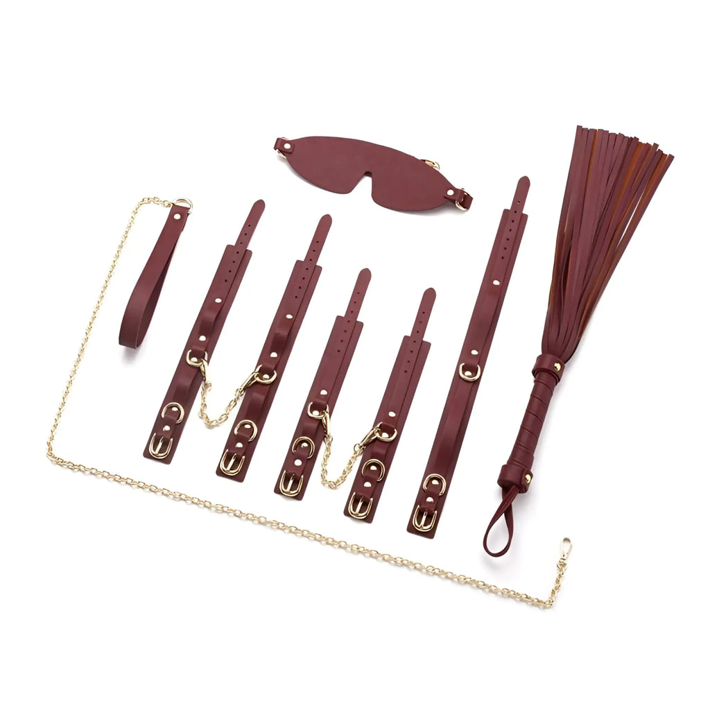 Daytona 8 pc deluxe bondage play kit in burgundy maroon leather with gold-tone metal hardware and chain accents
