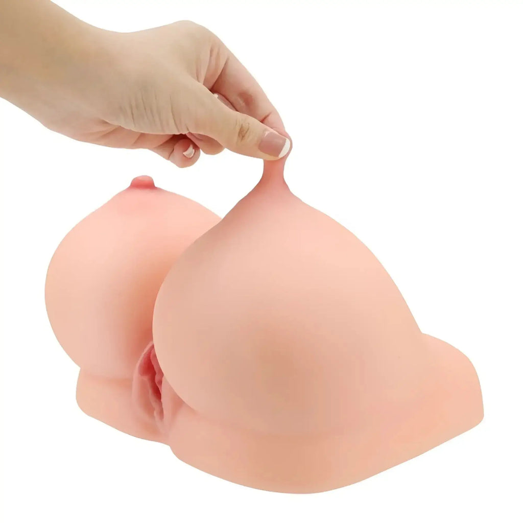 Pink silicone breast form with realistic texture and shape in daytona dolls alisha 2-in-1 pussy and titty fuck masturbator