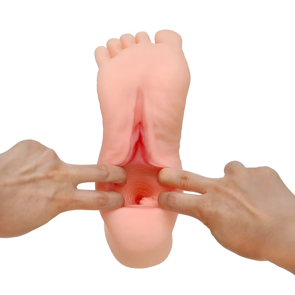 Pink silicone foot-shaped toy with realistic skin texture and detailed anatomy from daytona dolls foot fetish stroker pair