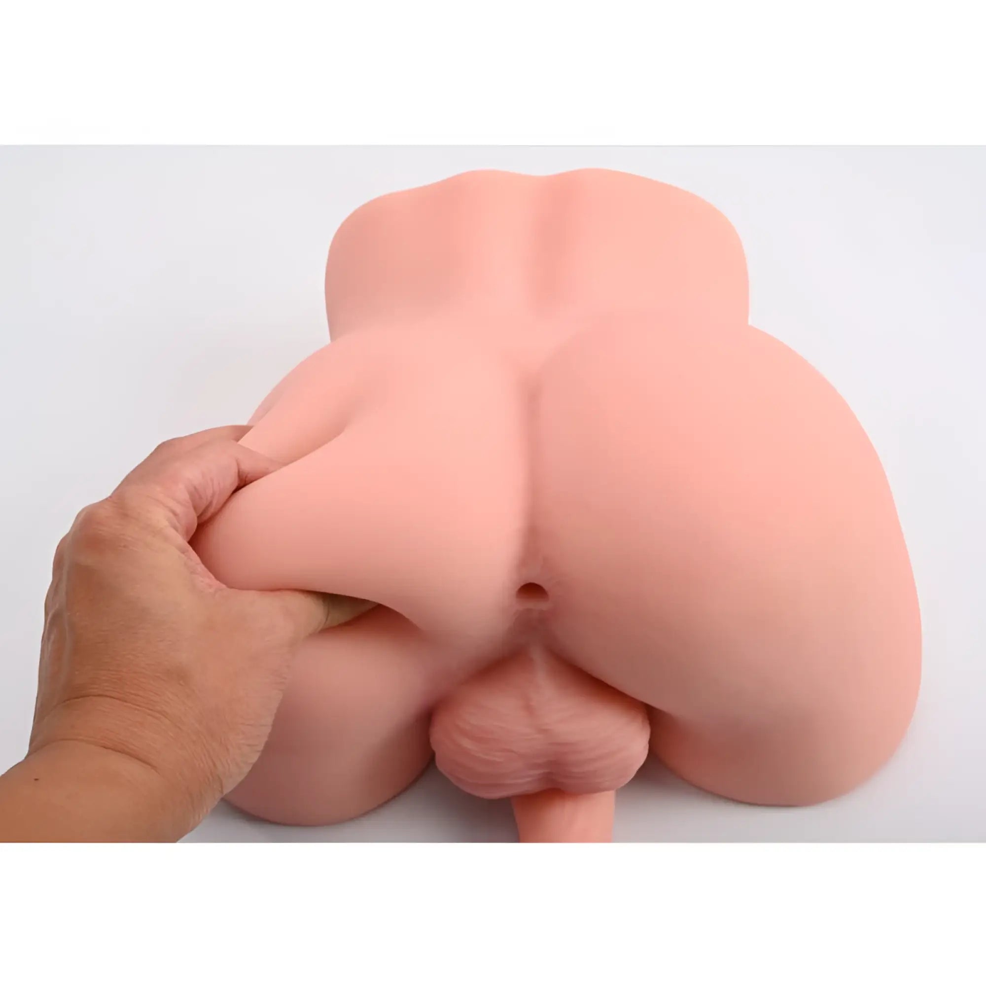 Pink silicone male torso adult toy with realistic cock and balls textured surface by daytona dolls