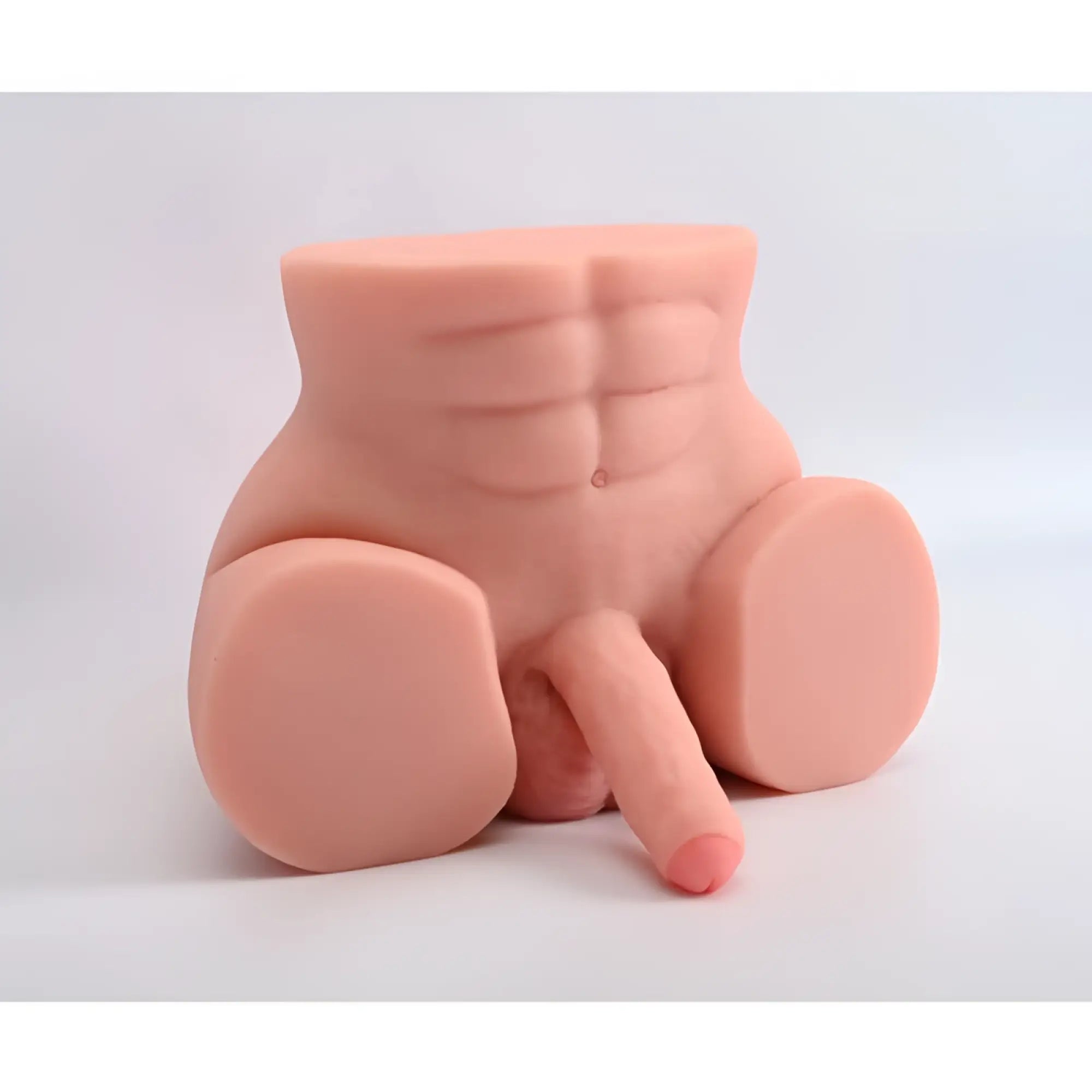 Pink silicone male torso with defined abs and genital model from daytona dolls lorenzo collection