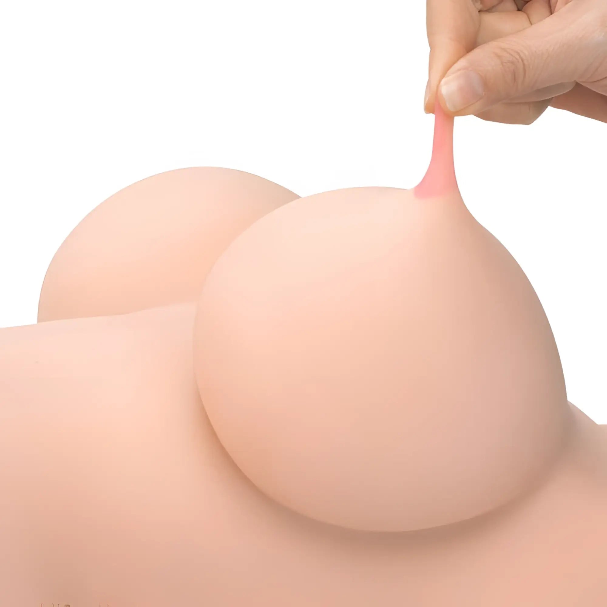 Pink silicone breast-shaped toy with soft realistic texture and smooth surface from daytona dolls love torso helen