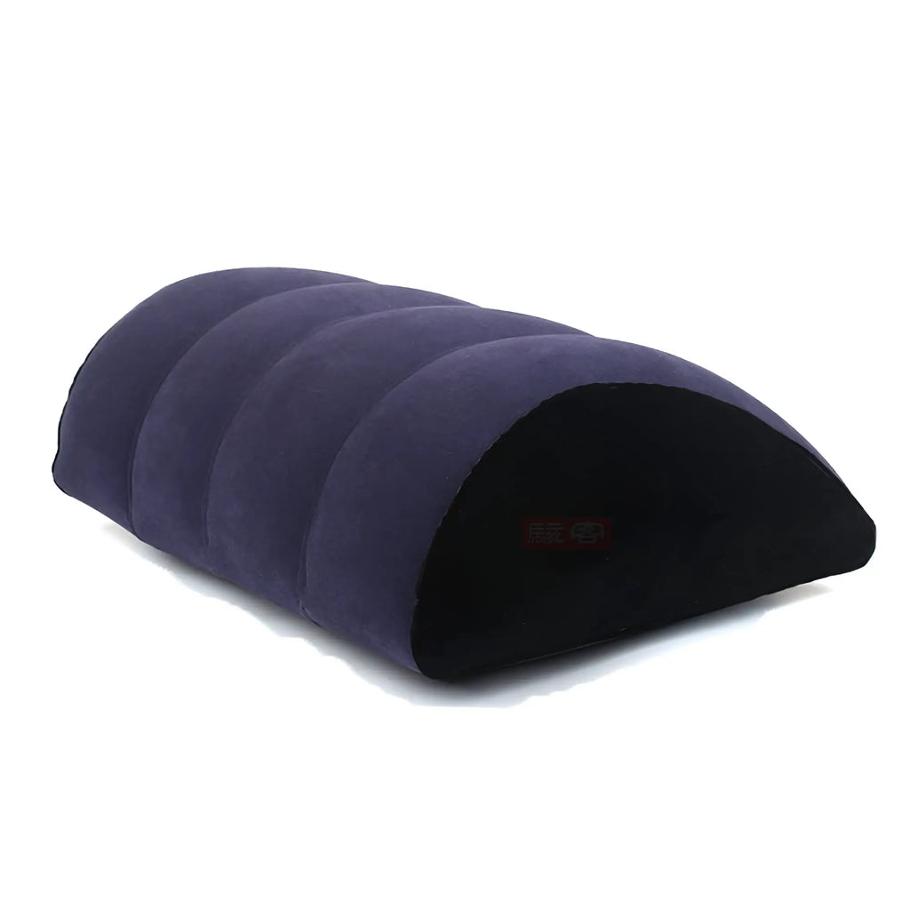 Purple daytona inflatable sex positioning arc pillow with plush segmented design and black interior lining