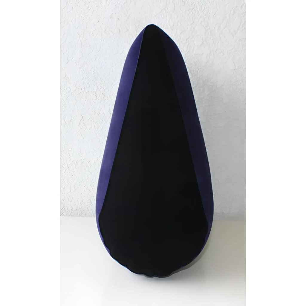 Daytona inflatable sex positioning triangular cushion with plush deep purple fabric and black inner lining in teardrop shape