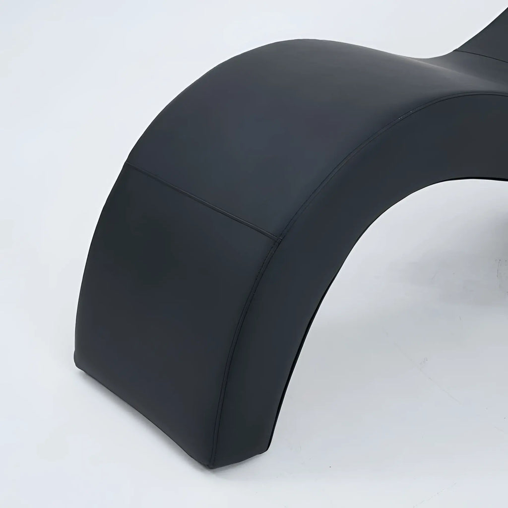 Black leather Daytona Kama Sutra Halo Arc Love Lounge recliner with sleek curved design for comfortable seating