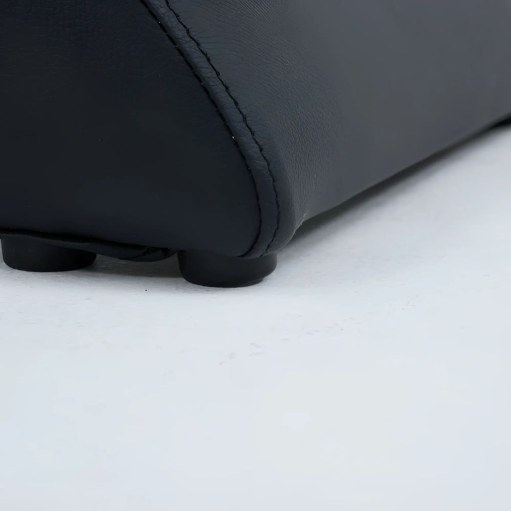Black leather sofa base with stitched edges and rounded feet from daytona kama sutra halo arc love lounge black