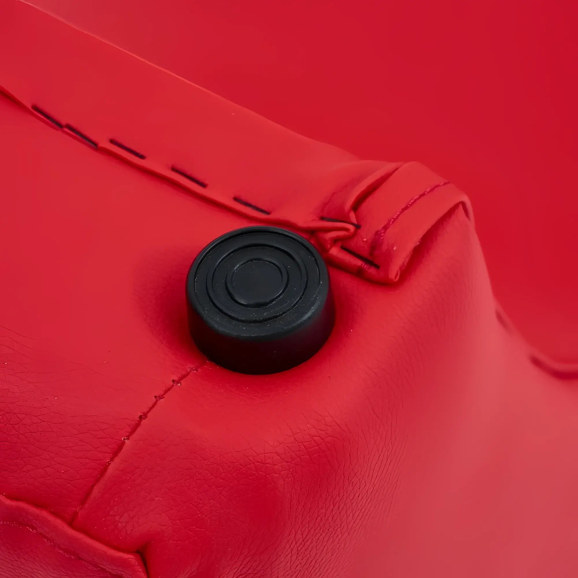 Black circular button on red leather fabric of daytona kama sutra halo arc love lounge red product