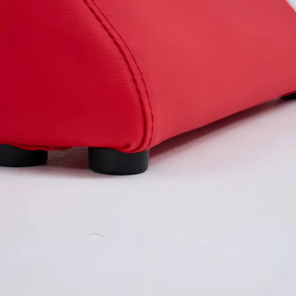 Red leatherette ottoman with black plastic feet from daytona kama sutra halo arc love lounge red collection