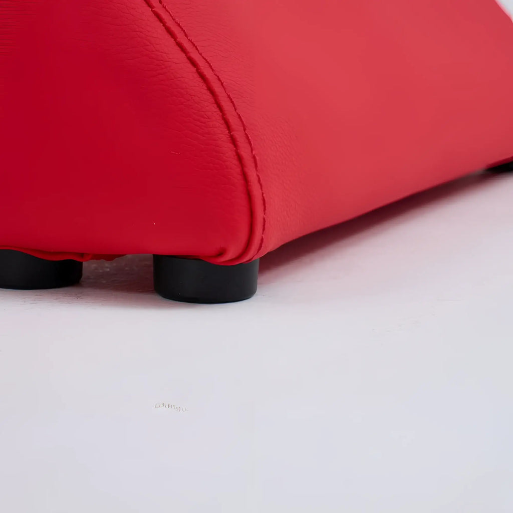 Red leatherette ottoman with black plastic feet from daytona kama sutra halo arc love lounge red collection