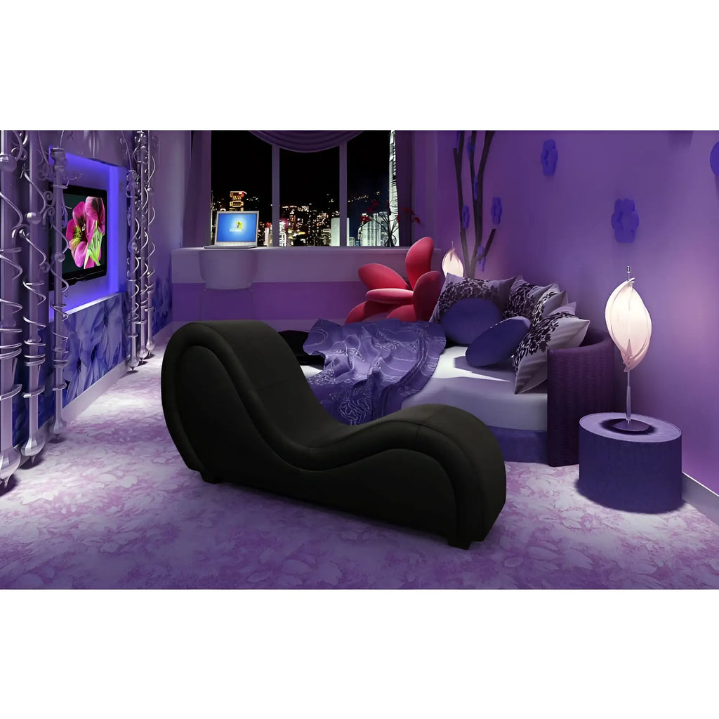 Black curved Daytona Kama Sutra Mebon chaise love lounge chair with sleek design and plush leather upholstery