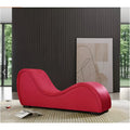 A vibrant red Daytona Kama Sutra Mebon chaise love lounge with sleek curves upholstered in smooth fabric