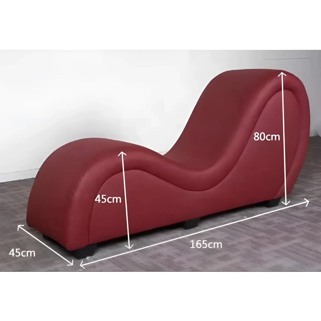 Daytona kama sutra mebon chaise love lounge in red plush with ergonomic curved design and black caster wheels